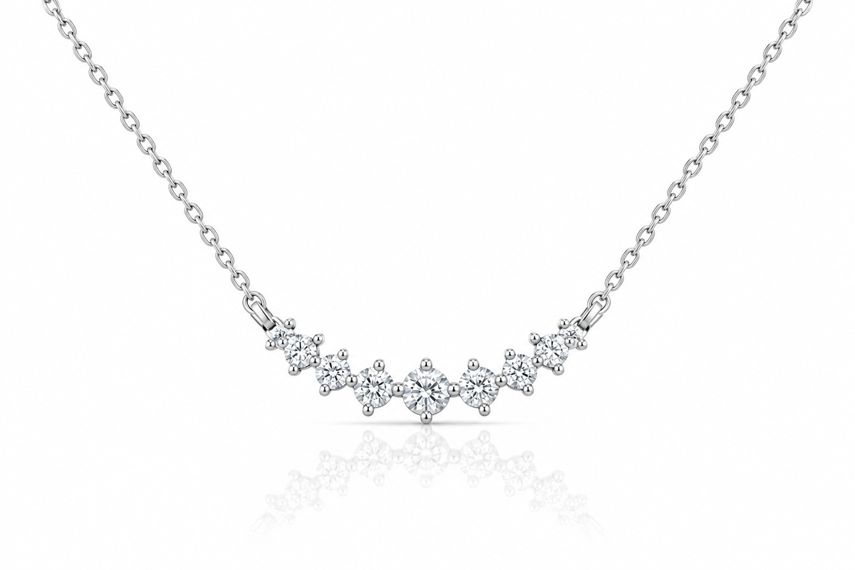Rhodium-plated 925 sterling silver graduated CZ curve necklace