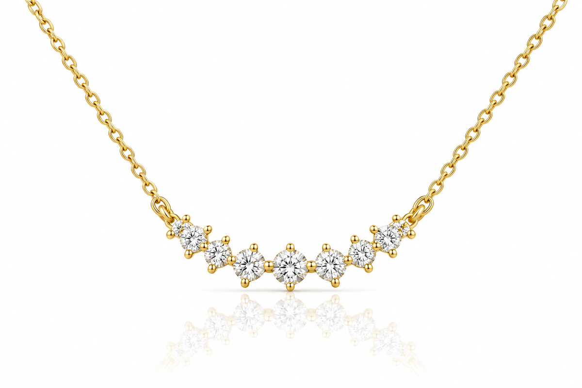 Gold-plated 925 sterling silver graduated CZ curve necklace